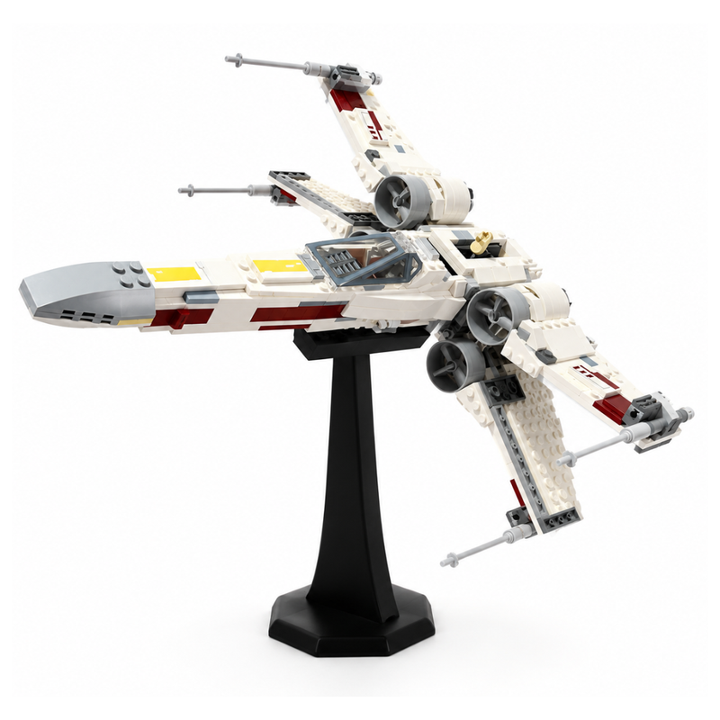 Model of a spaceship on a stand with a white background